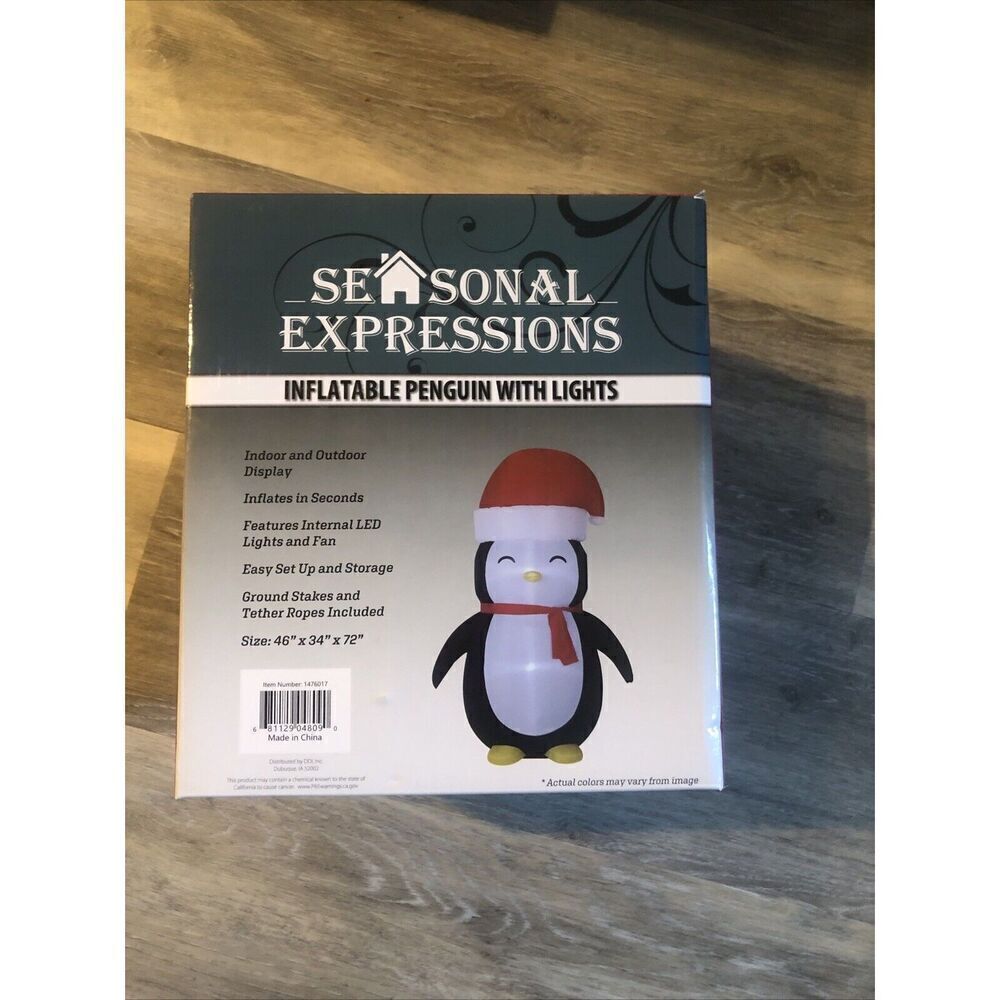Seasonal expressions Airblown Inflatable Penguin with led lights. 46”x34”x72”